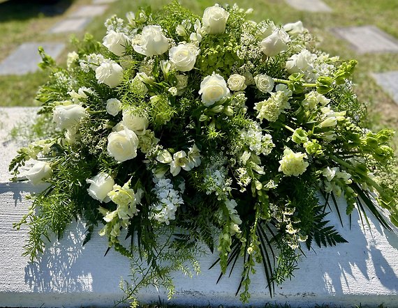 White Harmony Casket Spray